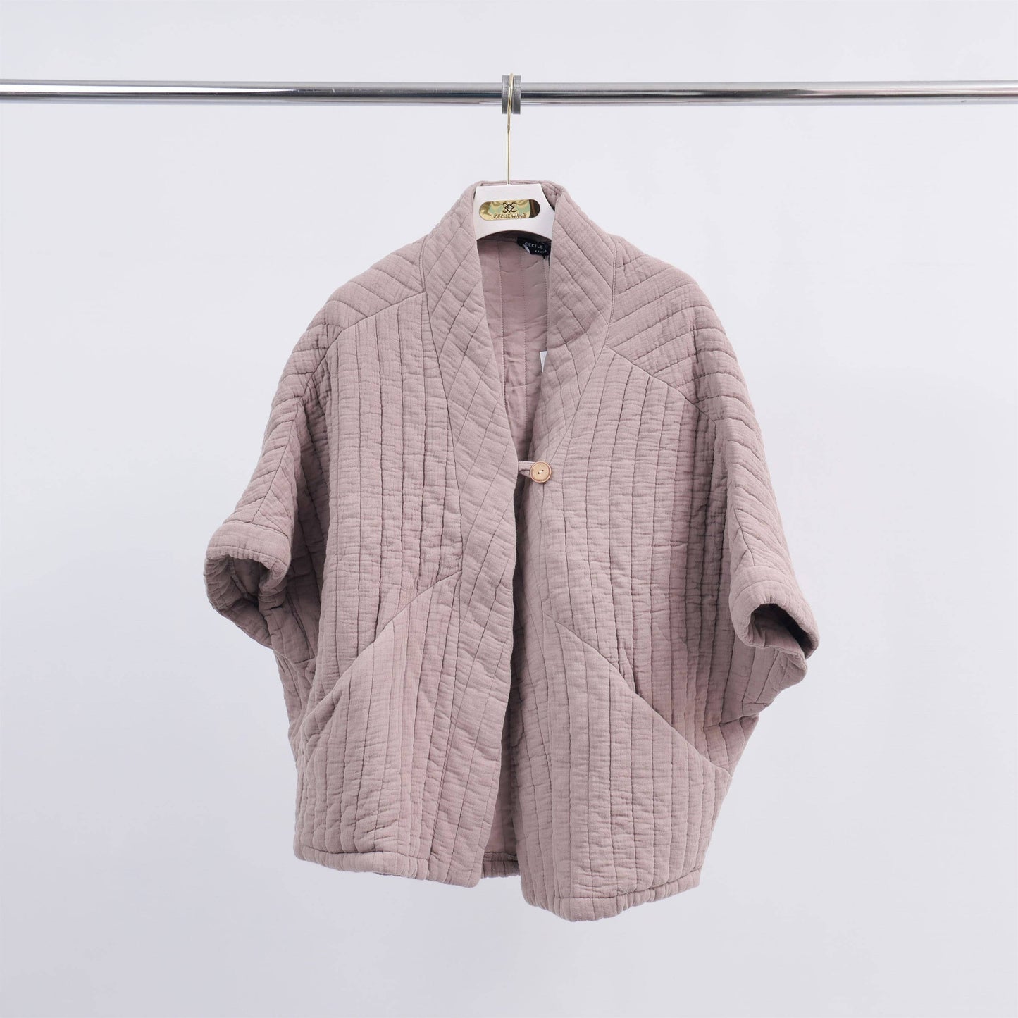 quilted sleeveless vest: Taupe