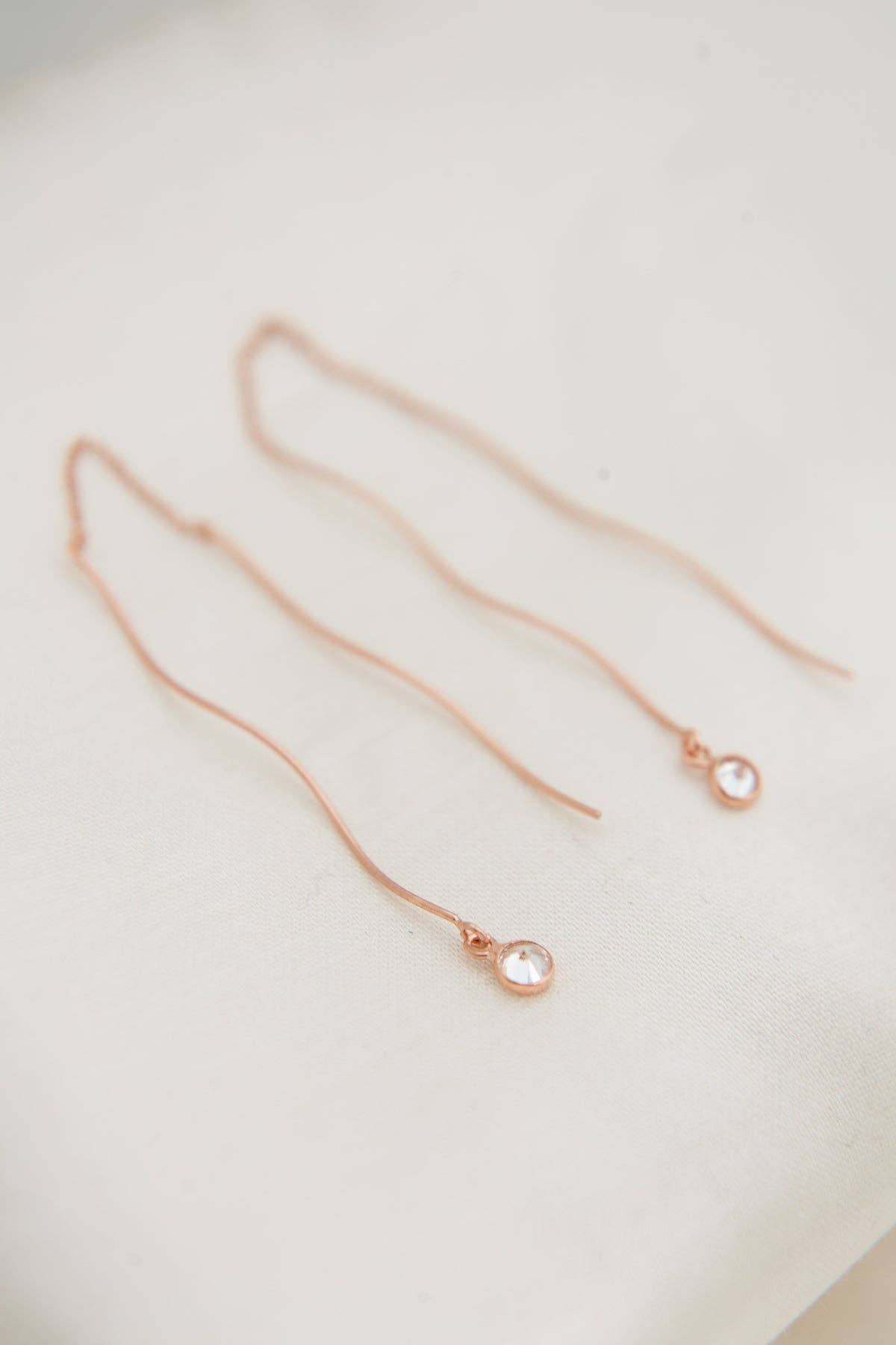 Dangle Wave Solitaire Earrings